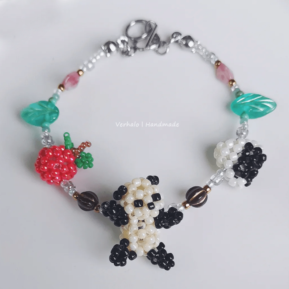 Beaded panda bracelet with colorful beads on a white background