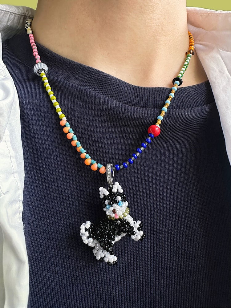 Handmade Necklace with a Husky dog pendant worn by a person - verhalo jewelry