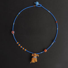 Handmade necklace with a cocker spaniel dog  pendant on a black background - verhalo custom jewelry