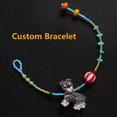 Custom bracelet with a dog charm on a black background - Verhalo handmade Jewelry