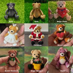 Collection of teddy bears made from beads in various colors and outfits on a grassy background.