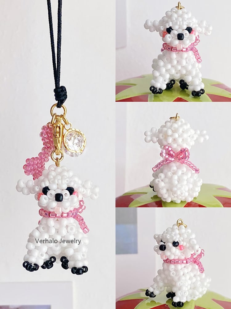 White bichon frise dog charm with a pink bow on a white background - verhalo custom jewelry
