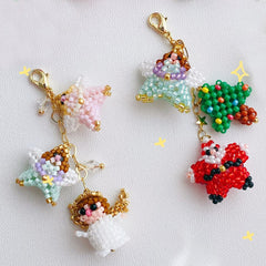 Colorful beaded charms shaped like twinkle stars on a white background - verhalo handmade