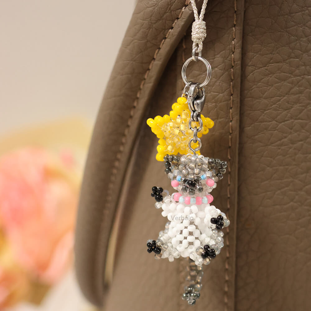 Beaded siamese cat  charm hanging on a leather surface - verhalo custom jewelry