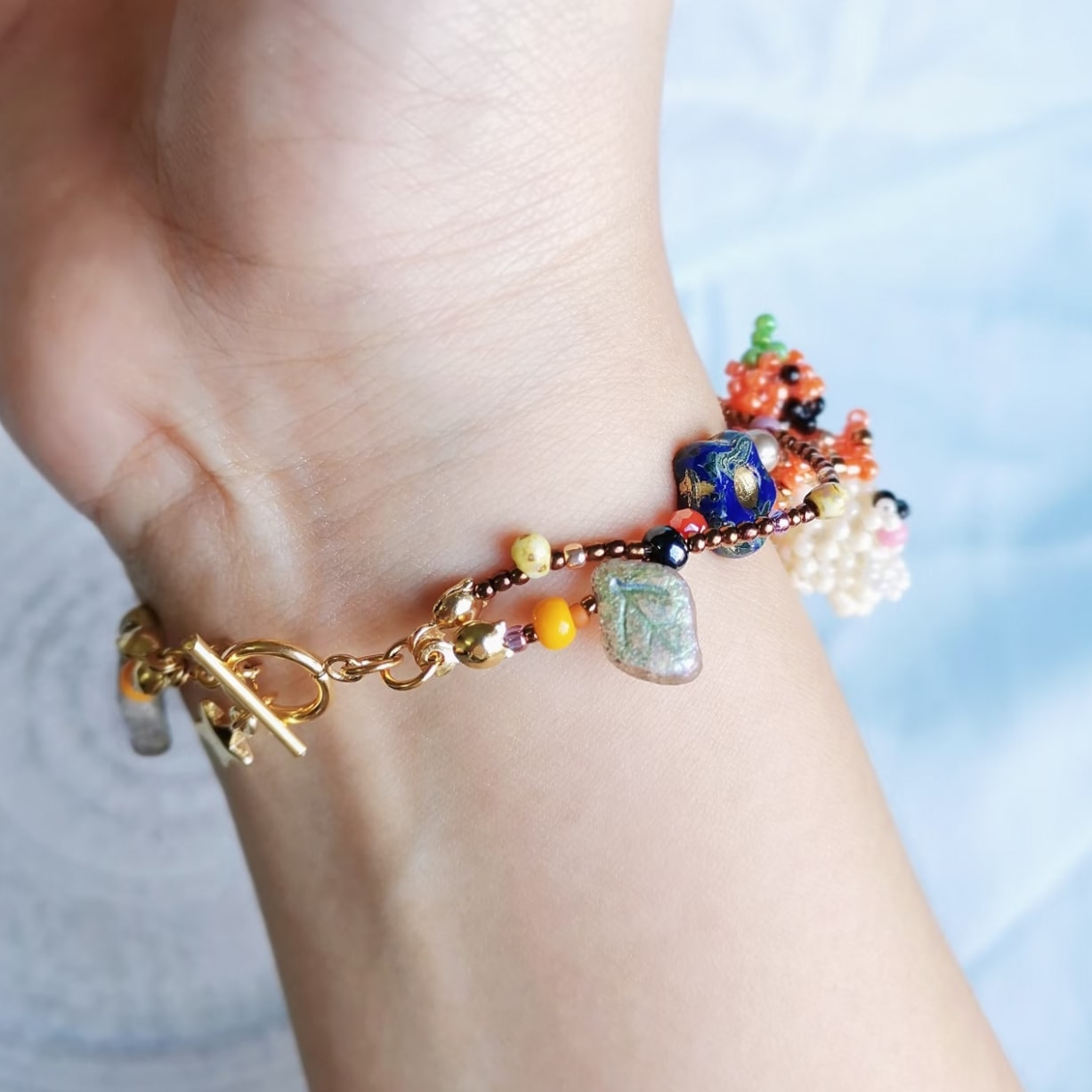 Halloween party Colorful beaded bracelet on a wrist with a blurred background
