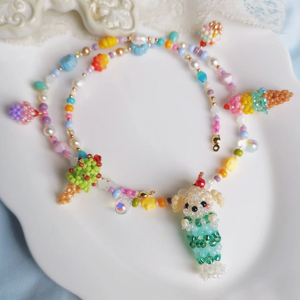 Colorful beaded necklace with a unique dog pendant on a decorative surface