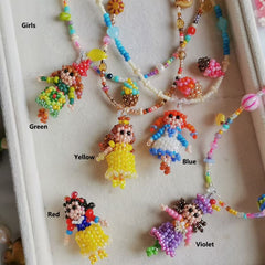Colorful beaded necklaces with girls and cakes pendants on a white background - Verhalo custom jewelry