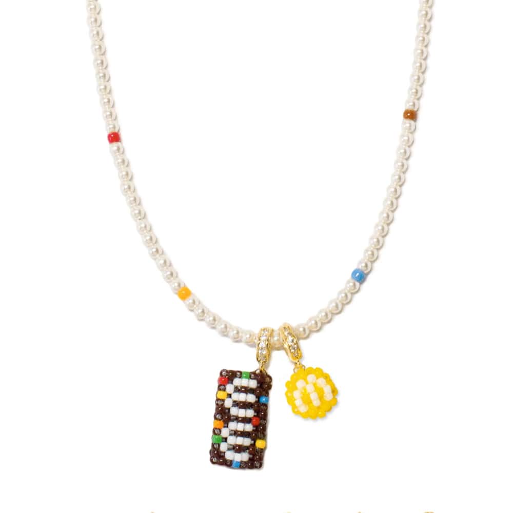 Necklace with colorful charm and letter 'M' on a white background