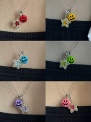 Star-shaped necklaces with colorful emoji beads on a black background