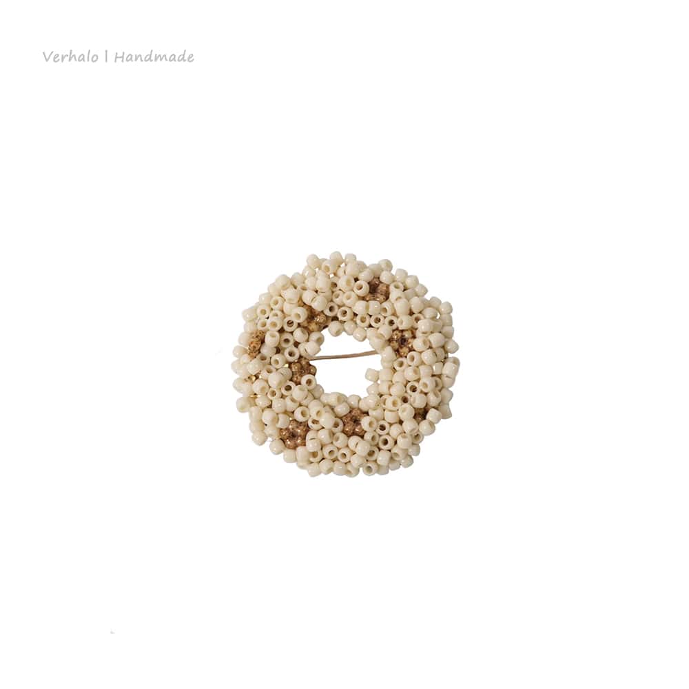 Small beaded brooch on a white background with 'Verhae | Handmade' text.
