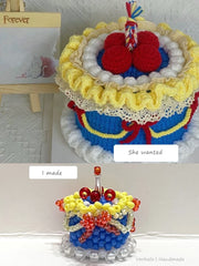 handmade cake ring from verhalo-Colorful crocheted cake with red berries on a white background