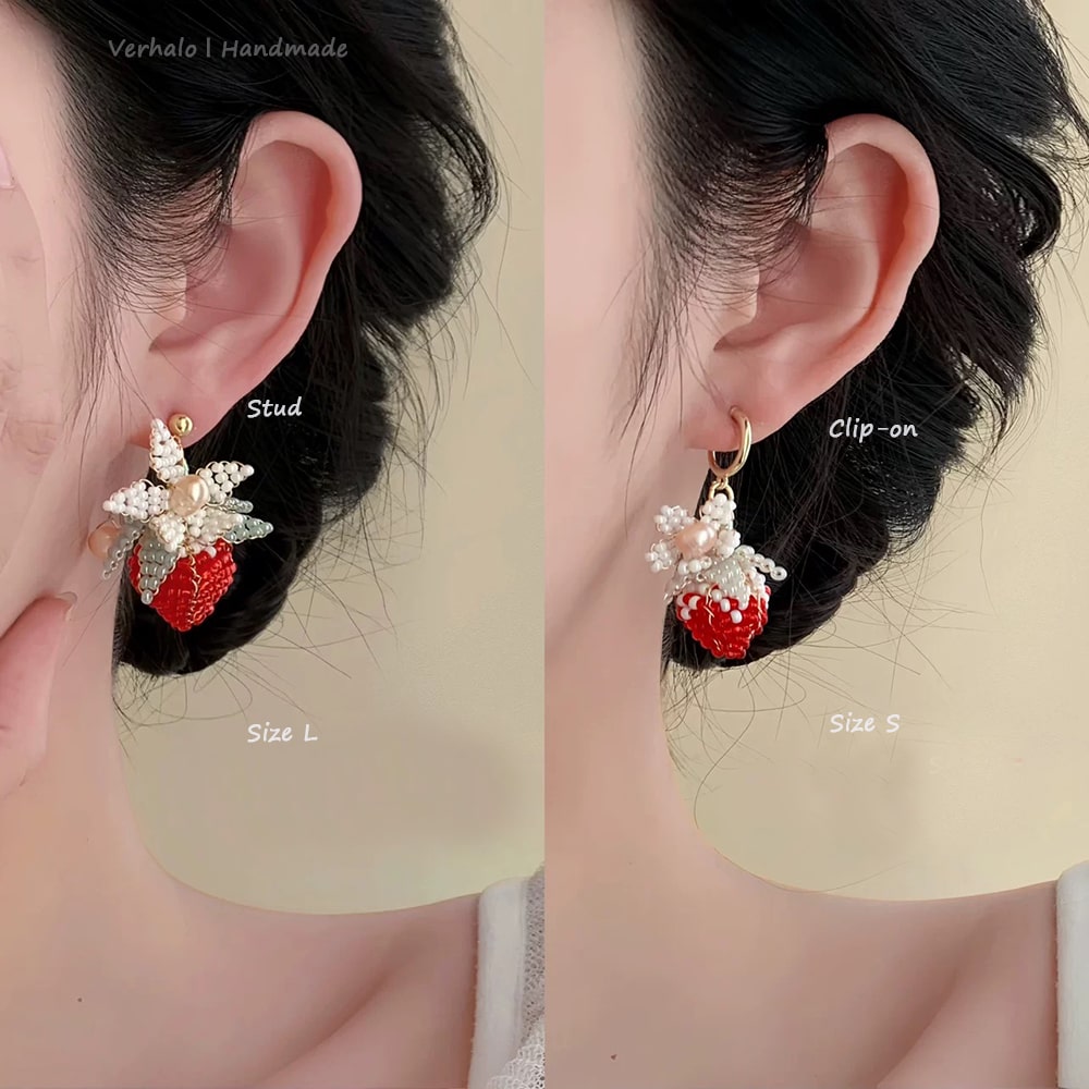 Two strawberry-shaped earrings, one stud and one clip-on, on a person's ears with labels indicating size and type.